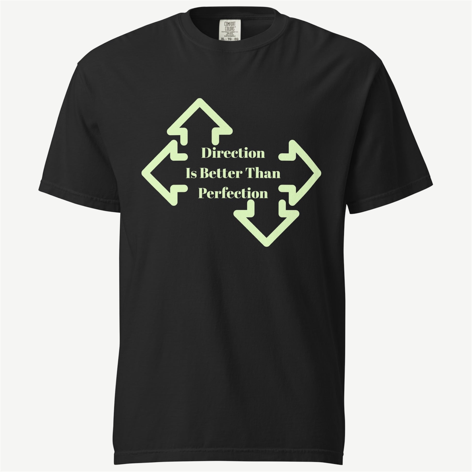 A black short-sleeve crewneck t-shirt with a light green graphic on the chest. The graphic features four arrows pointing outwards, surrounding the text 'Direction Is Better Than Perfection' in a light green serif font.