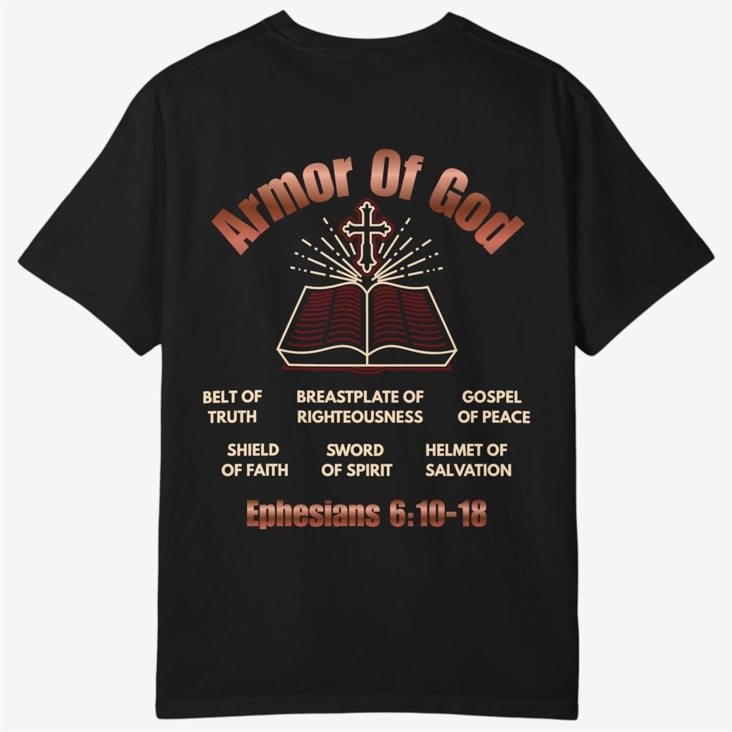 A black short-sleeve t-shirt with a graphic print on the back featuring the text 'Armor Of God' and 'Ephesians 6:10-18' in a distressed reddish-brown font, surrounding an illustration of an open Bible with a cross on top.